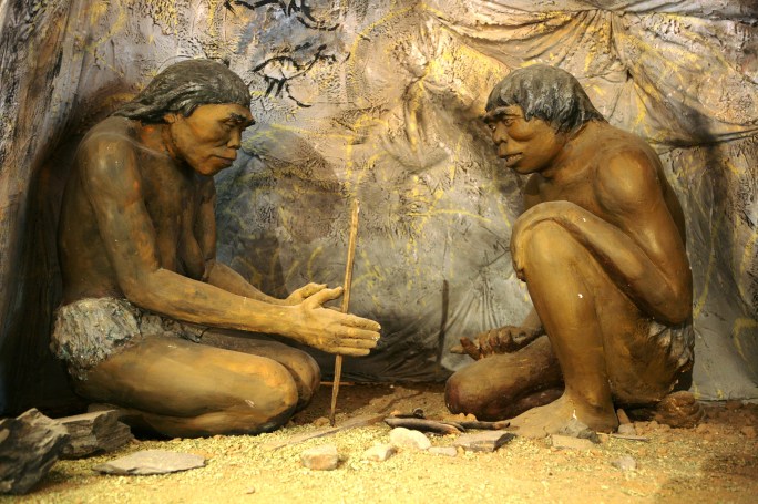 cavemen make fire
